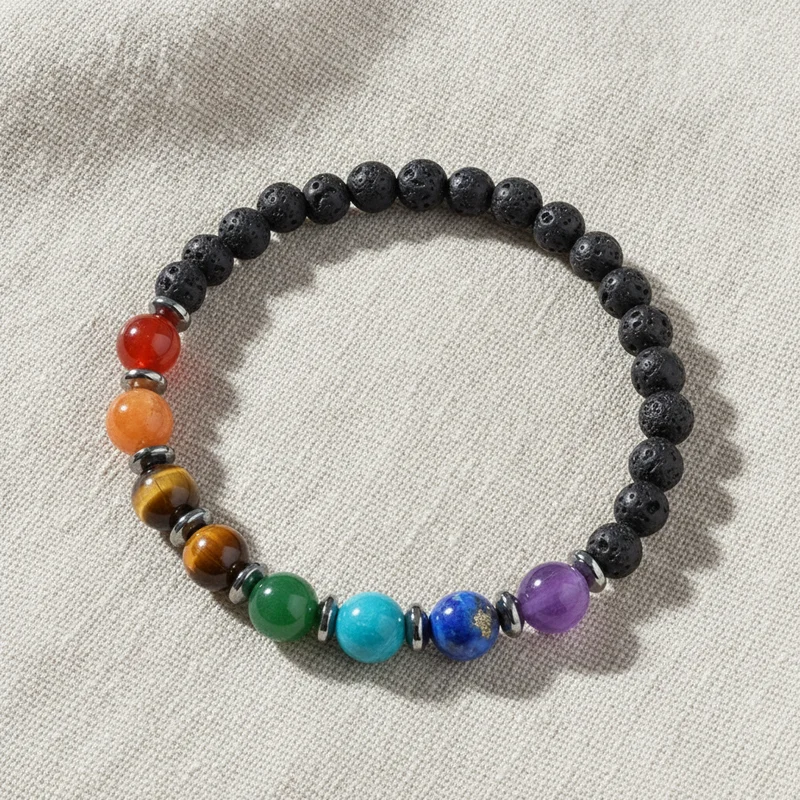 Bracelet 7 chakras pierre de lave sur lin clair