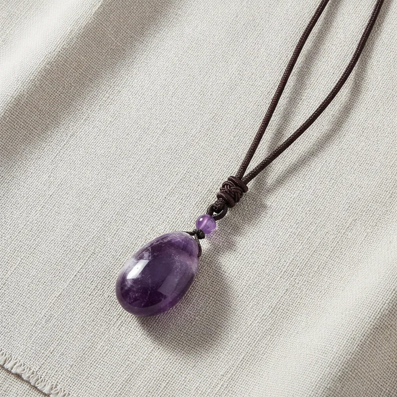 Pendentif améthyste sur lin clair