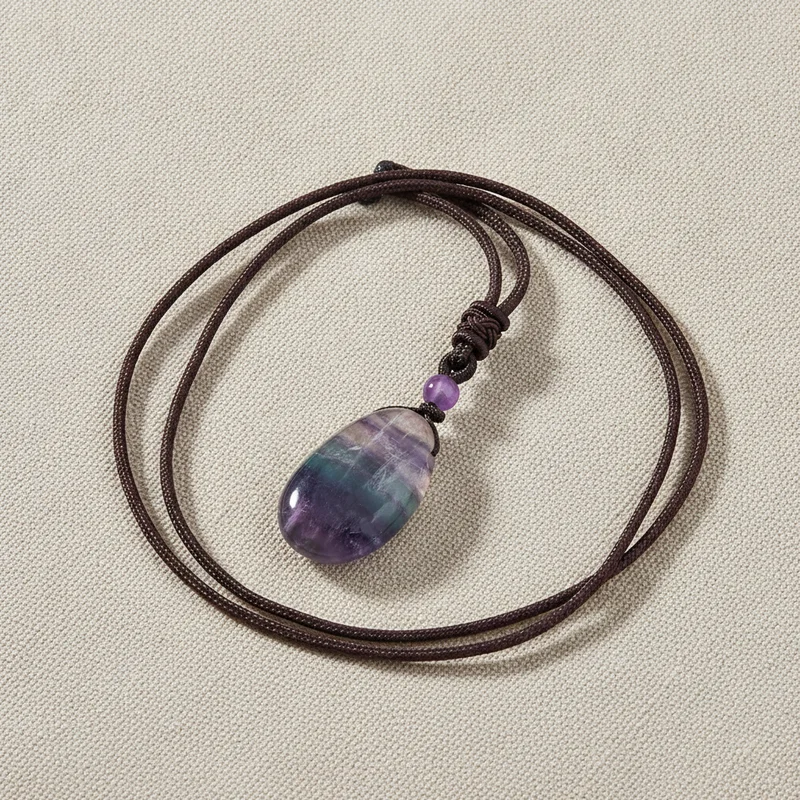 Pendentif fluorite sur lin clair