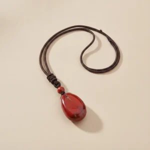 Pendentif jaspe rouge posé à plat