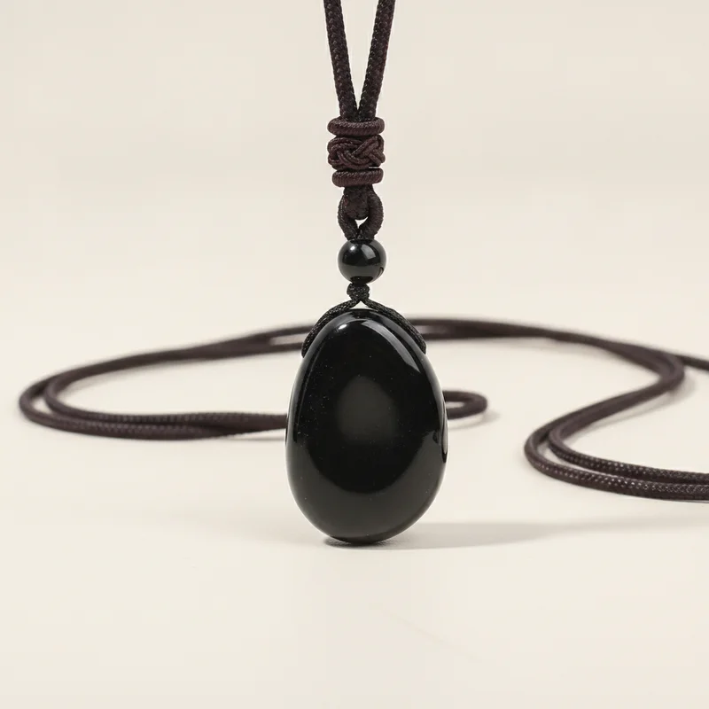 obsidienne-studio-1 Pendentif obsidienne noire posé à plat
