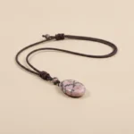 Pendentif rhodochrosite posé à plat