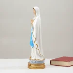 vierge-lourdes-chevet-1 Statue de la Vierge Marie vue de profil